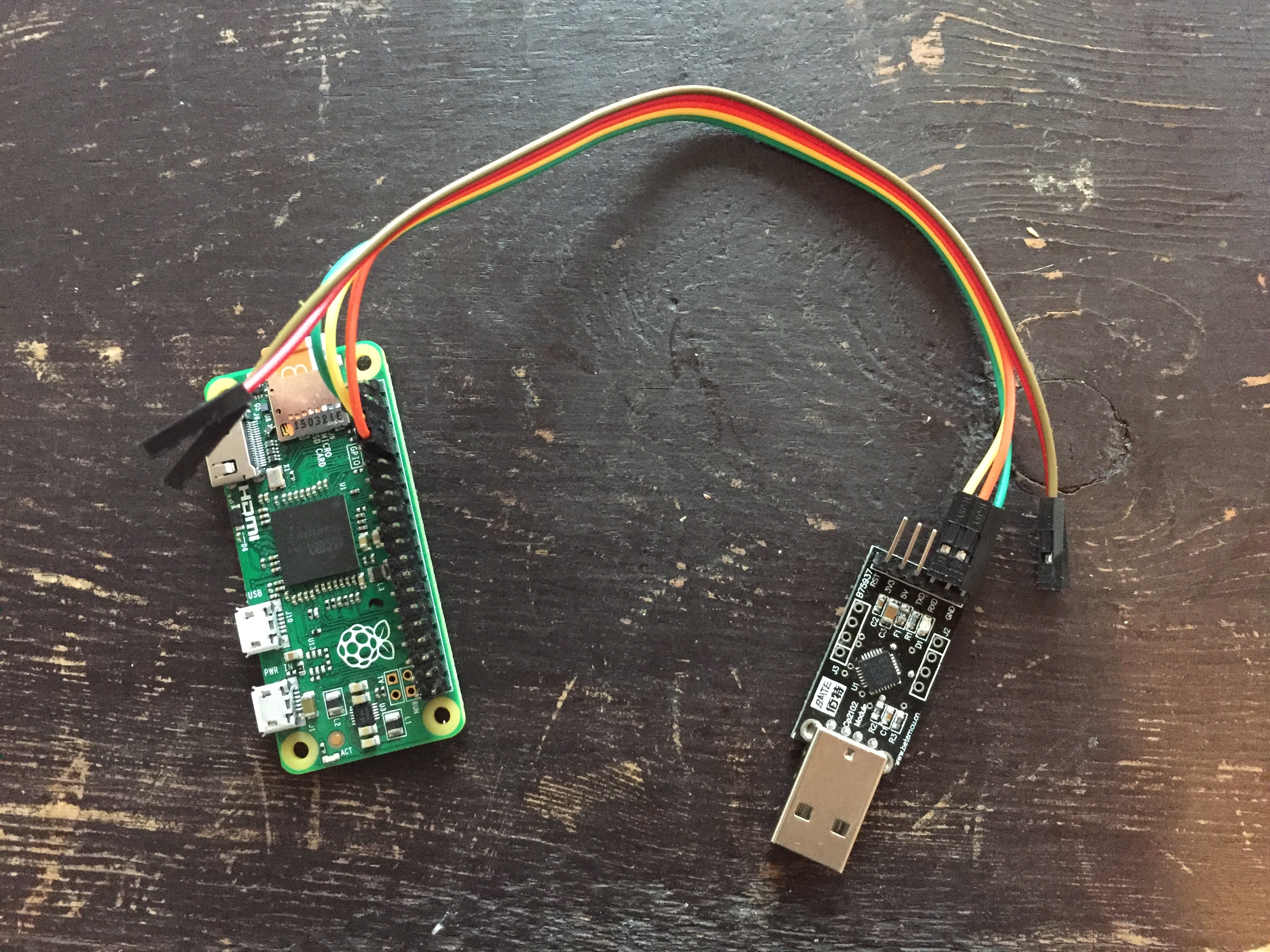 USB on one side, wires for connecting to the GPIO pins on the other